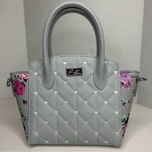 Elegant Quilted Satchel with Floral Accents